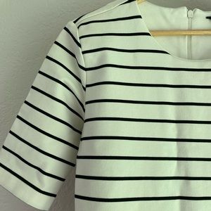 Stretch ponte tunic mini dress with slash pockets. Comfort + structure.